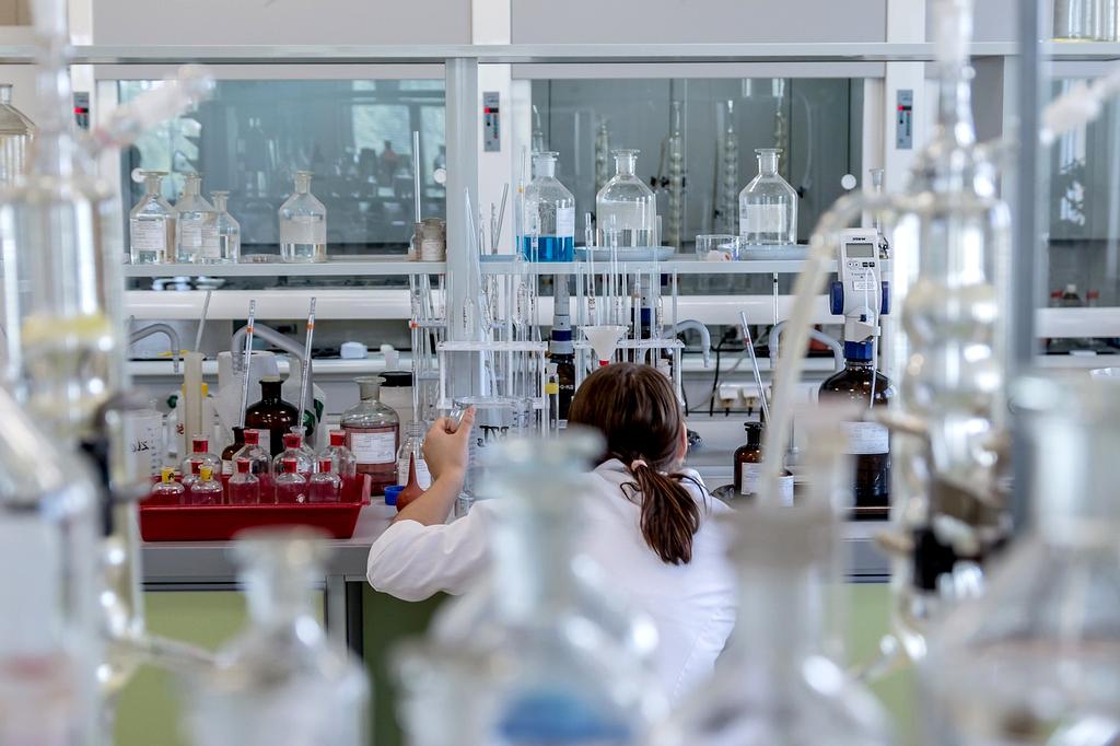 Scientists researching water quality in laboratory